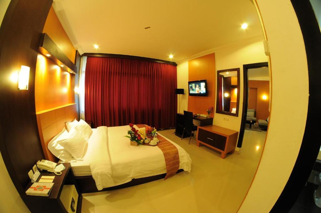 Hotel Swarna Dwipa Παλεμπάνγκ Δωμάτιο φωτογραφία