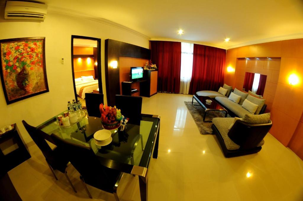 Hotel Swarna Dwipa Παλεμπάνγκ Δωμάτιο φωτογραφία